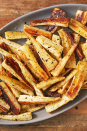 <p>Parsnips don't get nearly the attention they deserve, but that ends now. Roasting them makes them slightly sweet and perfectly tender for a quick side dish you might love more than the main course.</p><p>Get the <a href="https://www.delish.com/uk/cooking/recipes/a29871209/roast-parsnips-recipe/" rel="nofollow noopener" target="_blank" data-ylk="slk:Roasted Parsnips;elm:context_link;itc:0;sec:content-canvas" class="link ">Roasted Parsnips</a> recipe.</p>