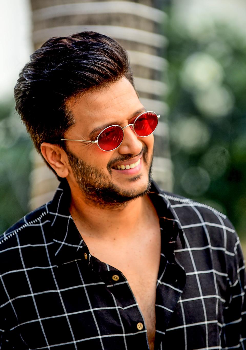 Bollywood actor Riteish Deshmukh poses for photographs during the promotion of his upcoming romantic action Hindi film 'Marjaavaan' in Mumbai on November 13, 2019. (Photo by Sujit Jaiswal / AFP) (Photo by SUJIT JAISWAL/AFP via Getty Images)