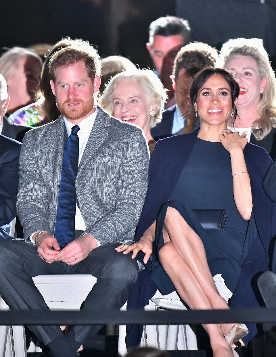 <p>For the Invictus Games opening ceremony on Saturday night, Meghan went for a more sophisticated ensemble in a navy Stella McCartney dress she previously wore for the Queen’s Birthday celebrations back in April. The Duchess teamed the $2,106 cape dress with a matching coat from Gillian Anderson’s British label, Winser London. Source: Getty </p>