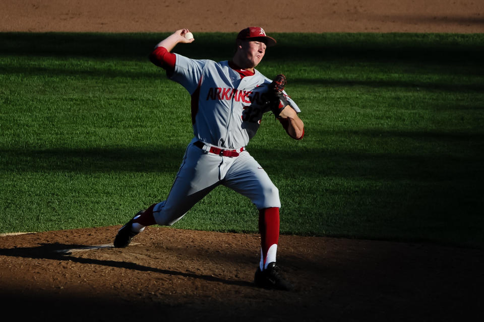 Jun 15, 2015; Omaha, NE, USA; Arkansas Razorbacks pitcher Zach Jackson (32) pitches against the Miami Hurricanes in the seventh inning in the 2015 College World Series at TD Ameritrade Park. Miami defeated Arkansas 4-3. Mandatory Credit: Steven Branscombe-USA TODAY Sports