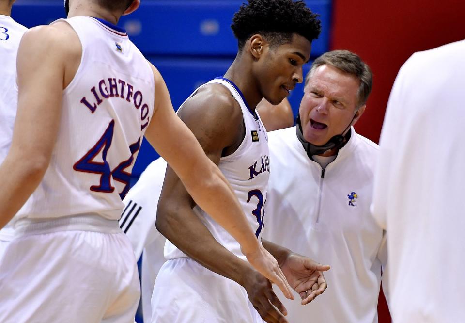 Just after Kansass Ochai Agbaji hit a huge three-pointer, giving Texas Tech reason to call a timeout, Kansas coach Bill Self got fired up with the junior guard on his way to the bench during the second half of Saturday's Big 12 Conference game at Allen Fieldhouse on February 20, 2021. KU beat Tech, 67-61. (Rich Sugg/The Kansas City Star/TNS)