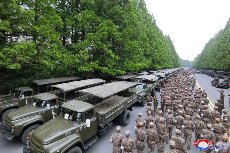 Military personnel from the Korean People's Army medical corps attend the launch of a campaign to improve the supply of medicines, amid the COVID-19 pandemic, in Pyongyang