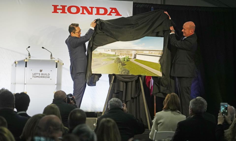 CEO Robert H. Lee and COO Rick Riggle of L-H Battery Co., the joint venture between LG Energy Solution and Honda to make batteries for the automaker's electric vehicles, unveil the rendering Tuesday of the new two-million-square-foot electric battery plant near Jeffersonville, Fayette County.