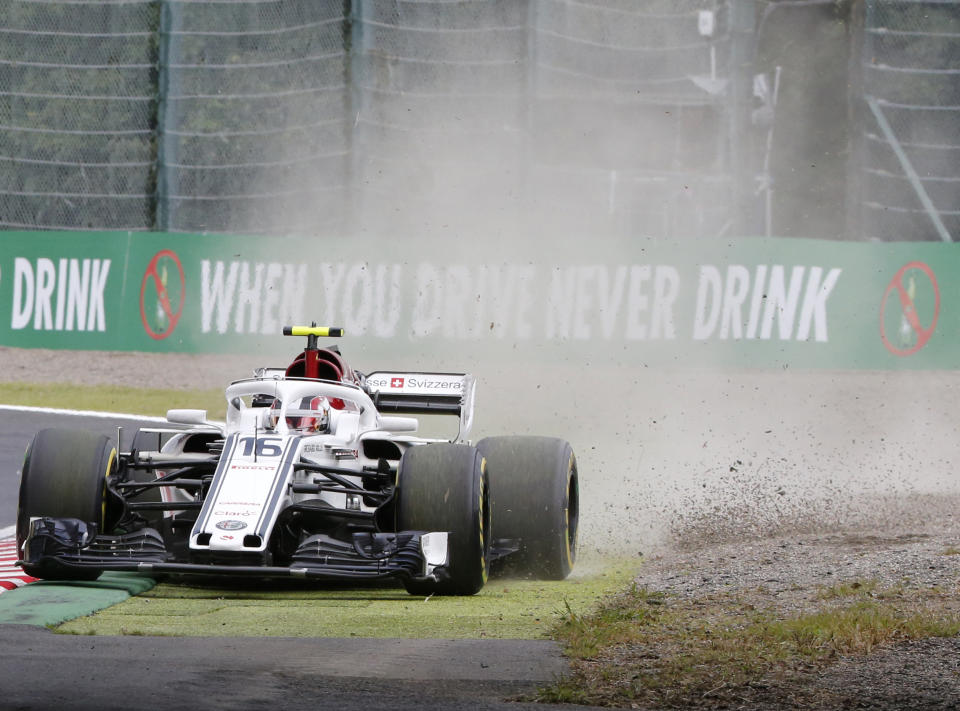 Sauber driver Charles Leclerc of Monaco steers his car on the dirt during the third practice session for the Japanese Formula One Grand Prix at the Suzuka Circuit in Suzuka, central Japan, Saturday, Oct. 6, 2018. (AP Photo/Toru Takahashi)