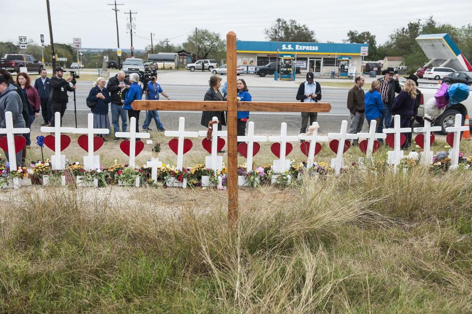 The crosses, erected across the street from the church, have become a meeting ground for mourners. (Photo: <a href="https://www.instagram.com/padreryan/" target="_blank">Laura Schimmel/Padre Ryan Photography for HuffPost</a>)