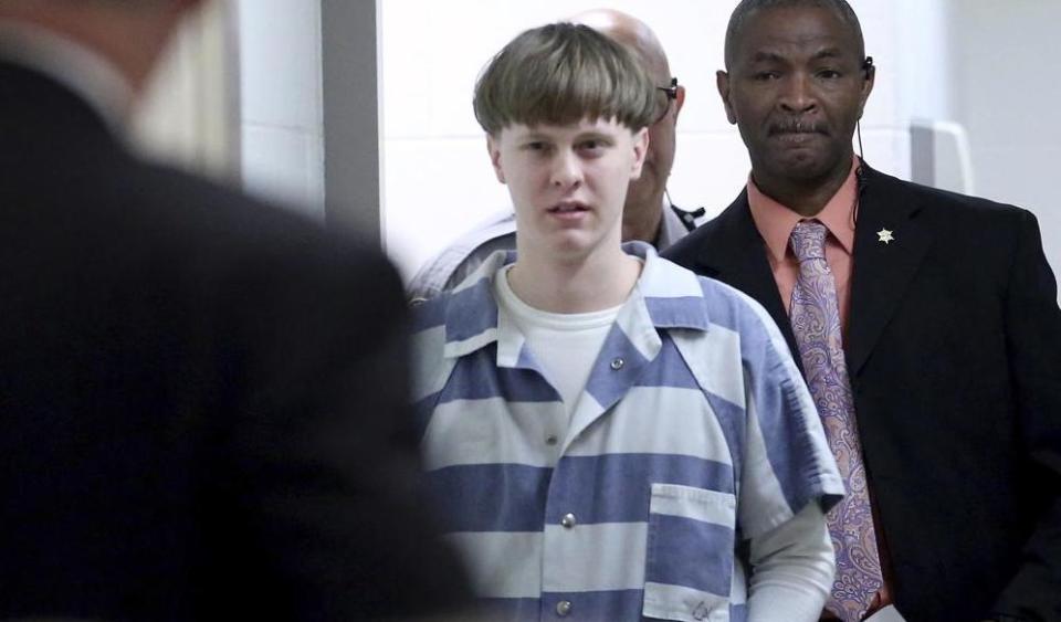 Dylann Roof enters the court room at the Charleston County Judicial Center in 2017 to enter his guilty plea on murder charges in Charleston, S.C. (Grace Beahm/The Post And Courier via AP, Pool, File)