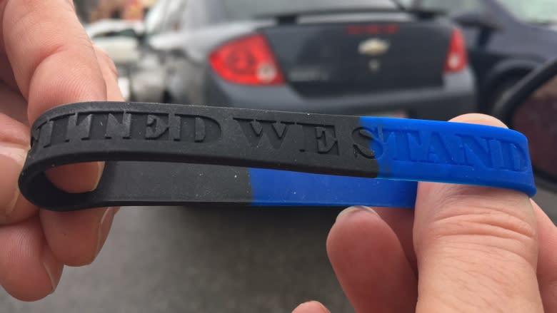 'Take a step back': Wristbands supporting charged officer shouldn't be worn on duty, leaders say