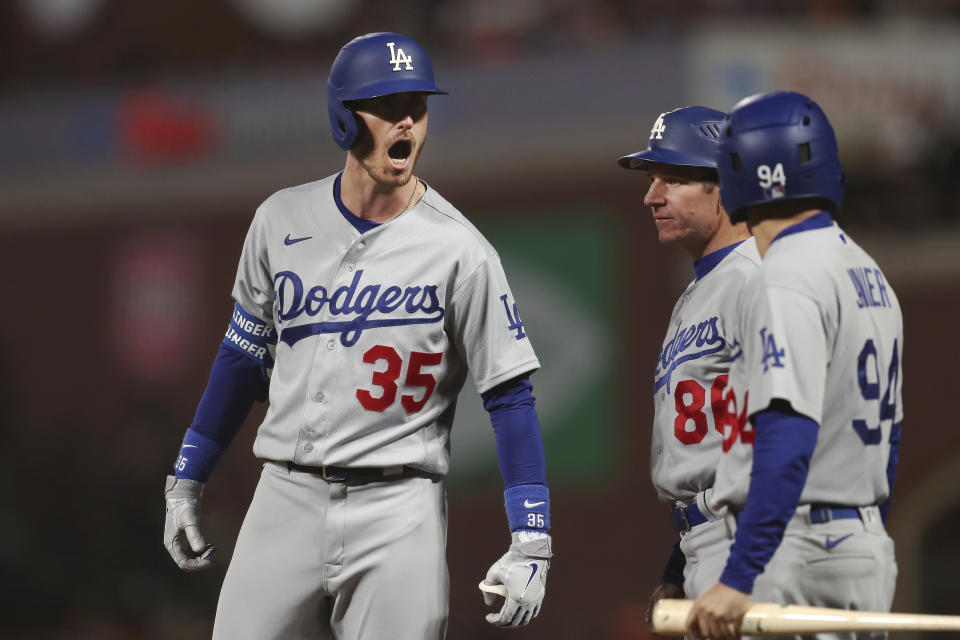 Los Angeles Dodgers' Cody Bellinger (35) reacts after hitting an RBI-single against the San Francisco Giants during the ninth inning of Game 5 of a baseball National League Division Series Thursday, Oct. 14, 2021, in San Francisco. (AP Photo/Jed Jacobsohn)