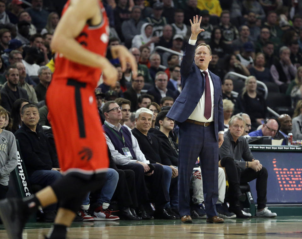 Milwaukee Bucks head coach Mike Budenholzer yells from the sideline during the first half of an NBA basketball game against the Toronto Raptors, Saturday, Jan. 5, 2019, in Milwaukee. (AP Photo/Aaron Gash)