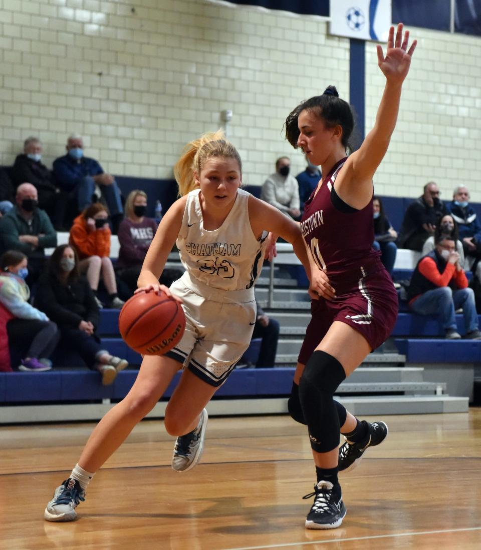 Morristown and Chatham girls basketball play at Chatham High School on January 25, 2022. Chatham's Ella Kreuzer #33 and Morristown's Anna Rivetti #10.