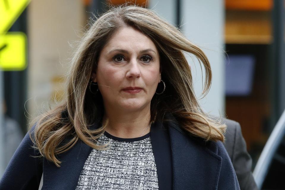 Michelle Janavs arrives at federal court, Tuesday, Feb. 25, 2020, in Boston, for sentencing in a nationwide college admissions bribery scandal. (AP Photo/Elise Amendola)