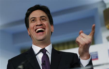 Britain's opposition Labour Party Leader Ed Milliband reacts to a journalist's question while speaking at the London Business School in London March 12, 2014. REUTERS/Suzanne Plunkett