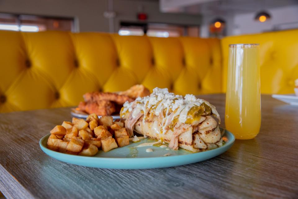 A borracho burrito and a mimosa at Jewel's Bakery and Cafe in Phoenix on April 12, 2023.