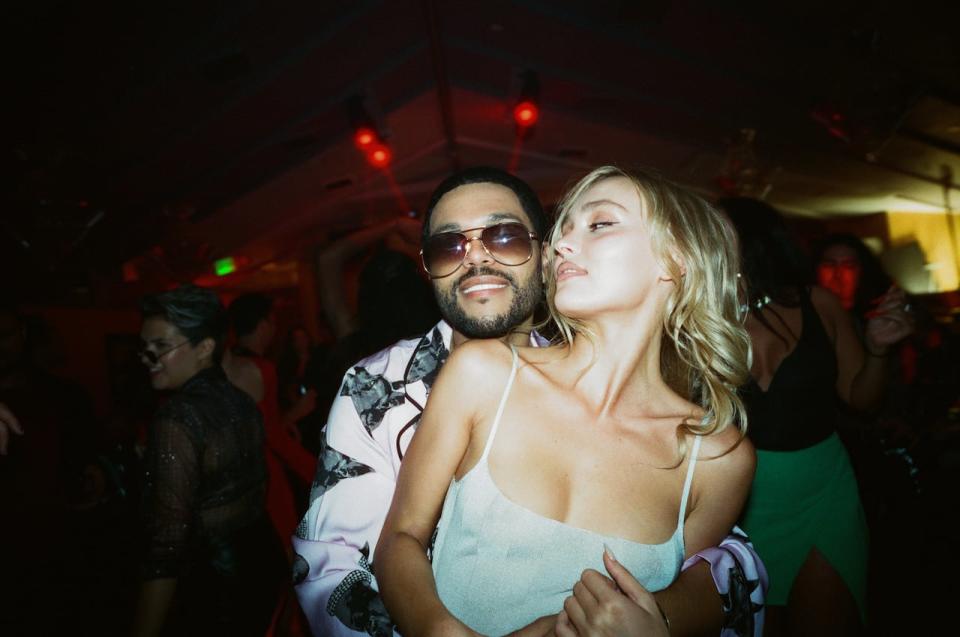 Abel “The Weeknd” Tesfaye and Lily-Rose Depp in a scene from Episode 1 of HBO's The Idol. 