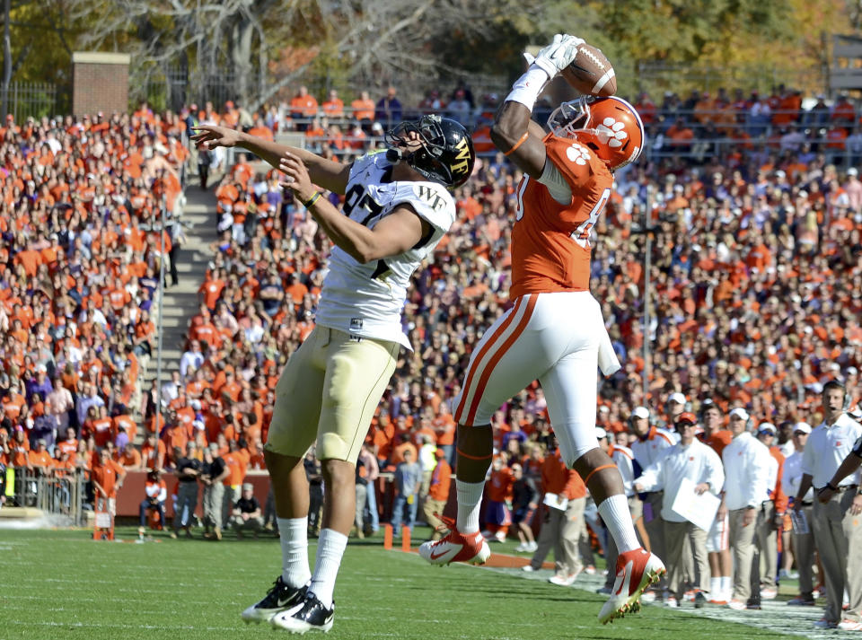 Clemson's Brandon Ford, right, pulls down a second quarter reception for a first down over Wake Forest's Matt James during an NCAA college football game against Wake Forest Saturday, Nov. 12, 2011, at Memorial Stadium in Clemson, S.C. (AP Photo/ Richard Shiro)