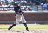 Seattle Mariners' Julio Rodriguez hits an RBI-single against the New York Mets during the seventh inning of a baseball game Sunday, May 15, 2022, in New York. (AP Photo/Noah K. Murray)