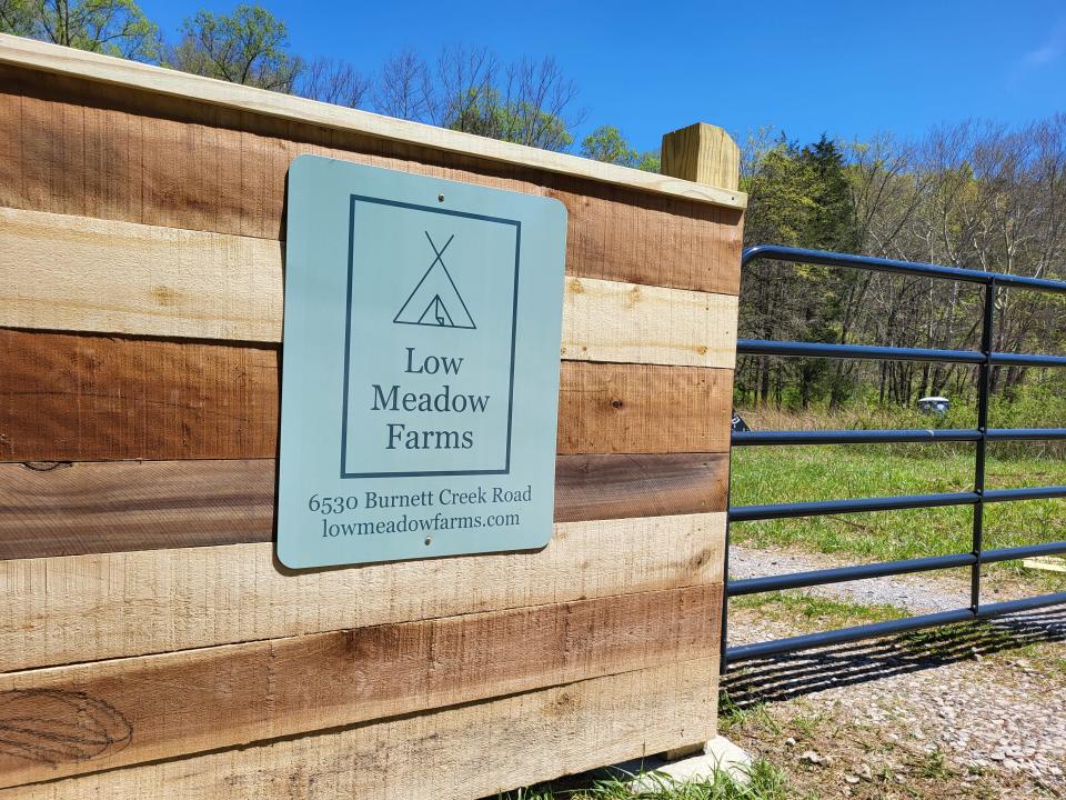 A new entrance for urban campground Low Meadow Farms, formerly known as Brown Bike Farms, South Knoxville, April 2023.