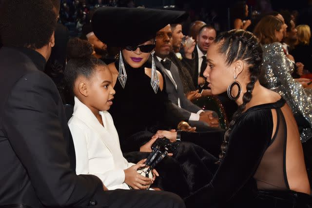 <p>Kevin Mazur/Getty</p> Blue Ivy Carter and Alicia Keys at the 2018 Grammys