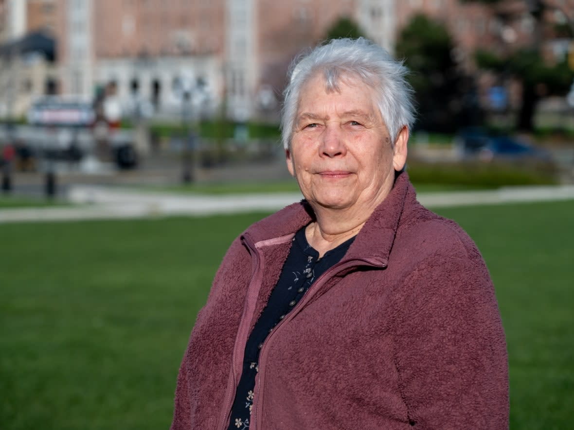 Betty Kabatoff in front of the B.C. Legislature, where she and other families belonging to the Sons of Freedom Doukhobors will receive an apology from the government for mistreatment in the 1950s. (Dillon Hodgin/CBC - image credit)