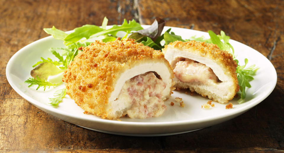 Woolworths deli cuts of Ingham's chicken Kiev, pictured on a plate, have been recalled amid choking fears. Source: Getty, file