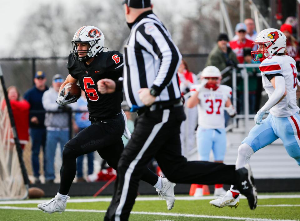 Republic's James Rexroat carries the ball against the Webb City Cardinals in the semifinal game of state football on Saturday, Nov. 25, 2023. The Tigers beat the Cardinals 21-20.