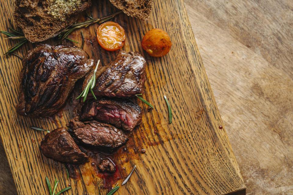 Cooked steak on a cutting board