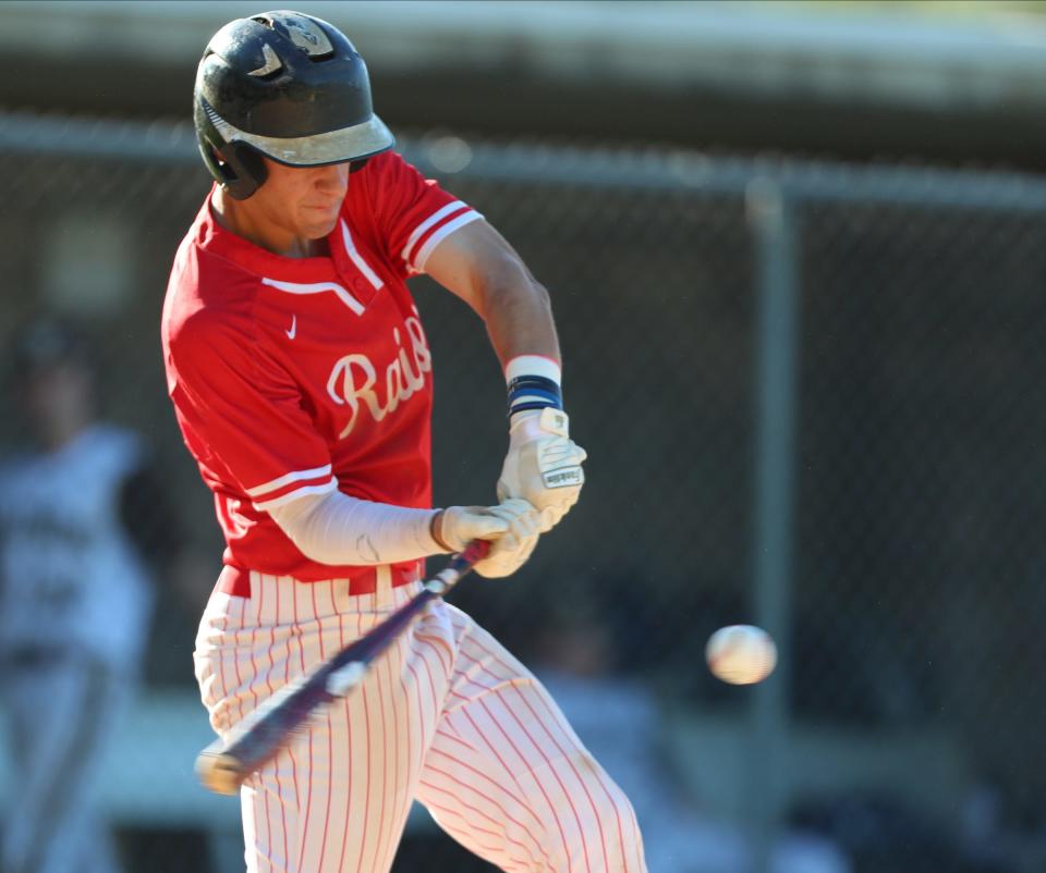 North Rockland's Jacob Pian (17) connects for a base hit during their 8-4 win over Clarkstown South in the opening round of Class AA baseball playoffs at Clarkstown South High School on Tuesday, May 17, 2022.
