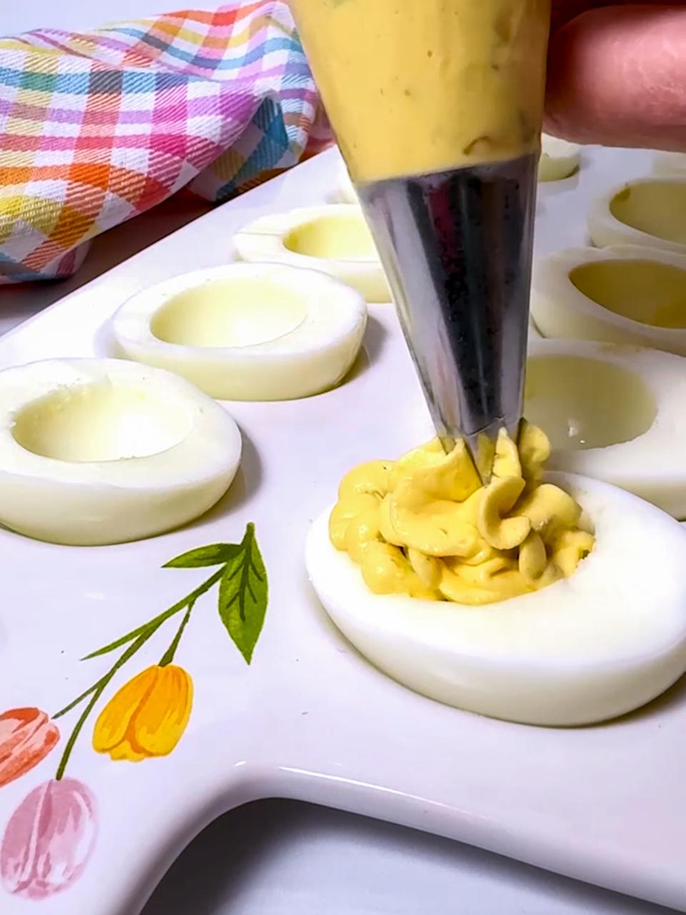 Piping the egg mixture gives the deviled eggs a fancy finish.