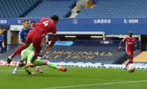 LIVERPOOL, ENGLAND - OCTOBER 17: (THE SUN OUT, THE SUN ON SUNDAY OUT )Virgil van Dijk of Liverpool collides with Everton's goalkeeper Jordan Pickford during the Premier League match between Everton and Liverpool at Goodison Park on October 17, 2020 in Liverpool, England. Sporting stadiums around the UK remain under strict restrictions due to the Coronavirus Pandemic as Government social distancing laws prohibit fans inside venues resulting in games being played behind closed doors. (Photo by John Powell/Liverpool FC via Getty Images)