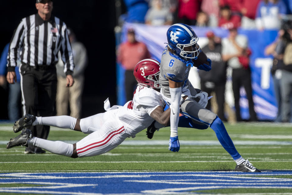 Alabama defensive back Terrion Arnold (3) dives to tackle Kentucky wide receiver Dane Key (6) during the first half of an NCAA college football game in Lexington, Ky., Saturday, Nov. 11, 2023. (AP Photo/Michelle Haas Hutchins)