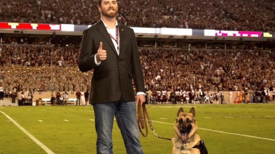 Cole Lyle with Kaya on the field of the Texas A&M University football stadium. (Cole Lyle/courtesy photo)