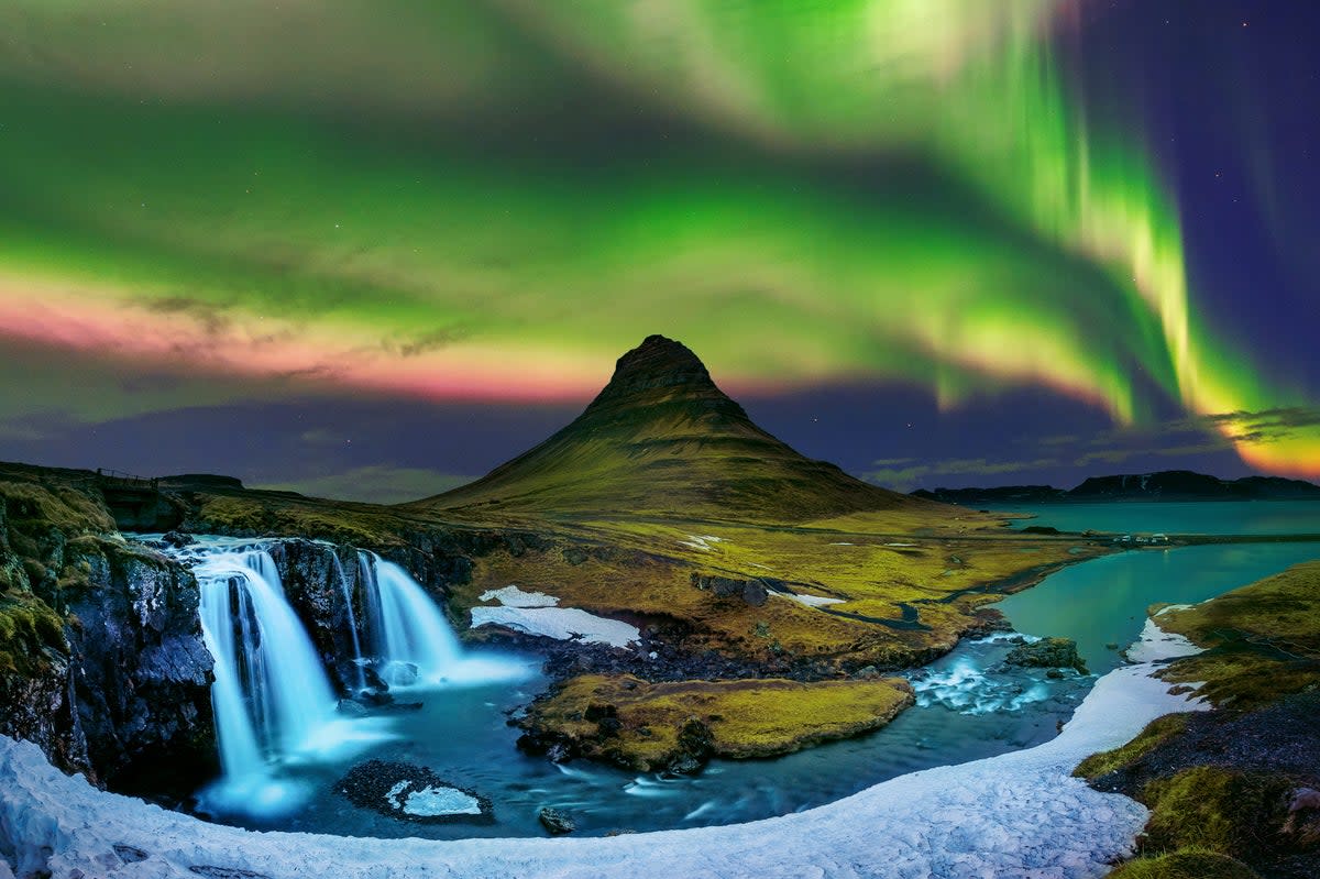 Kirkjufell mountain is a popular spot for viewing the Northern Lights  (Getty Images/iStockphoto)