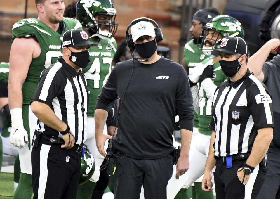 New York Jets head coach Adam Gase, center, looks on during a replay call in the second half of an NFL football game against the Los Angeles Rams in Inglewood, Calif., Sunday, Dec. 20, 2020. (Keith Birmingham/The Orange County Register via AP)