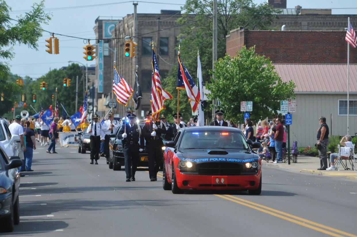 A Memorial Day parade takes place in downtown Lancaster.