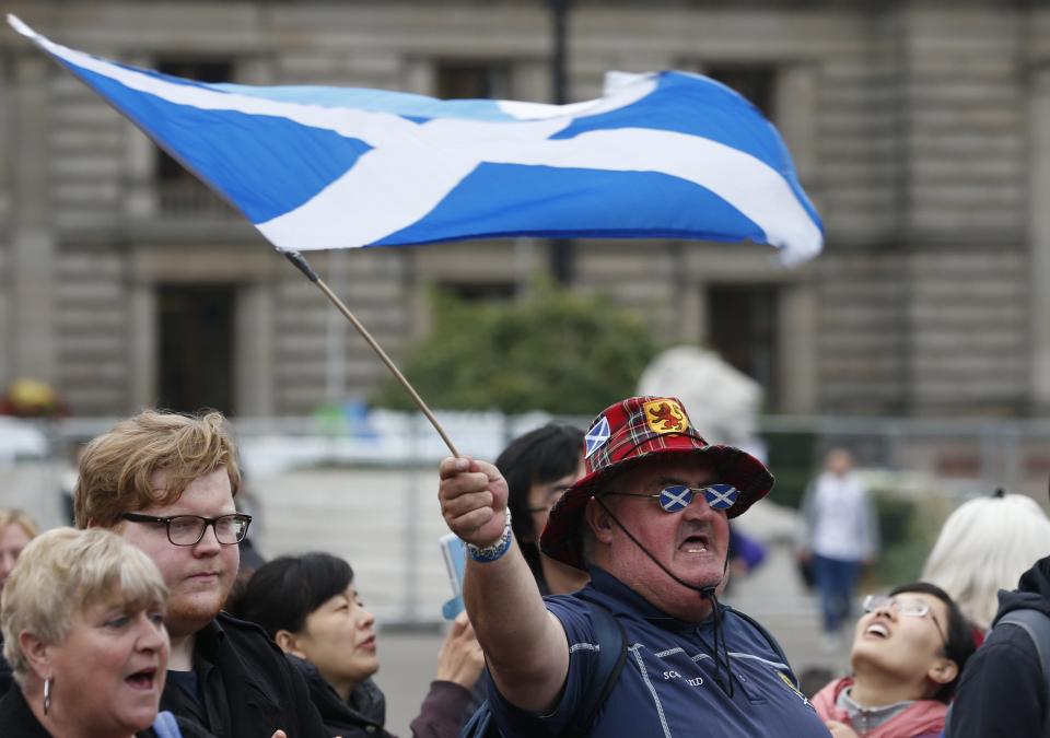 A supporter of the "Yes" campaign reacts in George Square after the referendum on Scottish independence in Glasgow