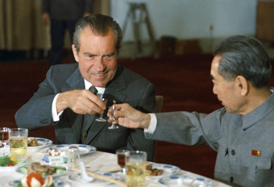 President Richard Nixon drinks baijiu with Zhou Enlai, the then Chinese Prime Minister during a state banquet in Beijing in 1972. (Photo12/UIG via Getty Images)