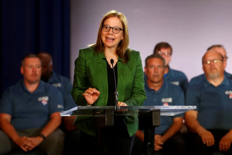 FILE PHOTO: General Motors Chairman and CEO Mary Barra makes a statement as members of the United Auto Workers bargaining committee listen at the start of contract talks between the union and automaker in Detroit