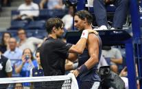 Old pals act: Rafael Nadal and David Ferrer embrace