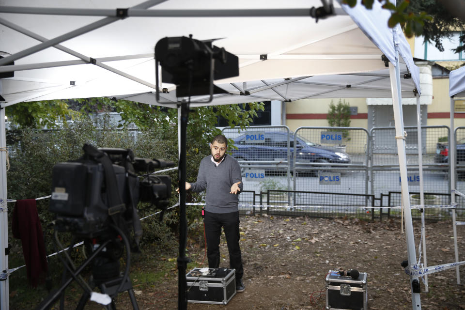 Media report outside Saudi Arabia's consulate in Istanbul, Sunday, Oct. 21, 2018. The chairman of the Senate Foreign Relations Committee says Saudi Arabia's Crown Prince Mohammed bin Salman "crossed a line" in the killing of journalist Jamal Khashoggi and must pay a price. Tennessee Republican Bob Corker says that based on his briefings he believes the royal known as MBS was behind the killing of the Saudi critic.(AP Photo/Lefteris Pitarakis)