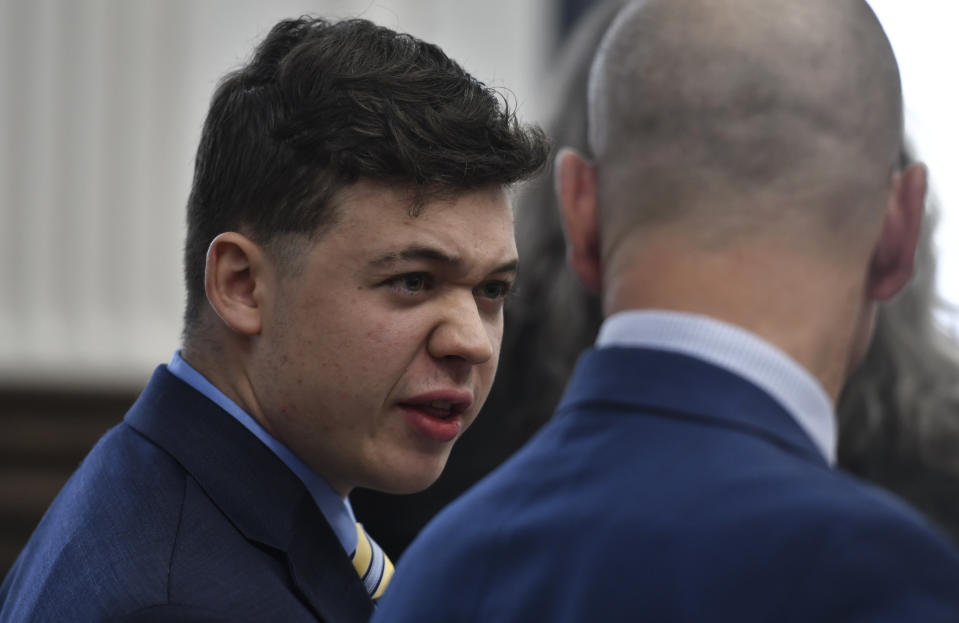 Kyle Rittenhouse talks with his attorney Corey Chirafisi before a break during his trial at the Kenosha County Courthouse in Kenosha, Wis., on Wednesday, Nov. 3 2021. Rittenhouse is accused of killing two people and wounding a third during a protest over police brutality in Kenosha, last year. (Sean Krajacic/The Kenosha News via AP, Pool)