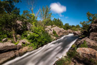 <p>Water flows through a branch of the Potomac River at the Chesapeake & Ohio Canal National Historic Park near Potomac, Maryland on August 22, 2016. The U.S. National Park Service celebrates its 100th anniversary on 25 August. (Jim Lo Scalzo/EPA) </p>