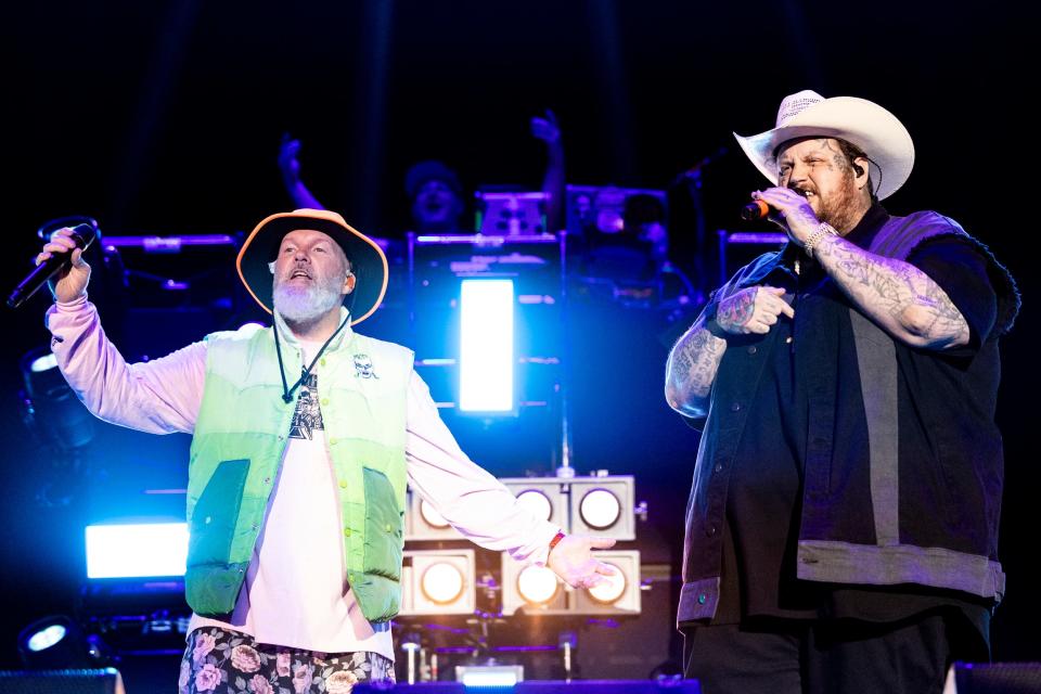 Fred Durst (left) and Jelly Roll (right) perform during Limp Bizkit's Day 2-closing set at Welcome to Rockville on May 10, 2024 at Daytona International Speedway.