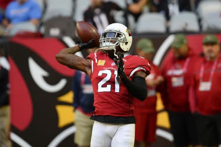 FILE PHOTO: Nov 18, 2018; Glendale, AZ, USA; Arizona Cardinals cornerback Patrick Peterson (21) warms up prior to facing the Oakland Raiders at State Farm Stadium. Mandatory Credit: Joe Camporeale-USA TODAY Sports