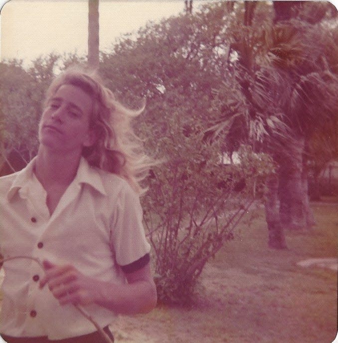 A younger Mike Jensen sported long, blonde surfer hair.