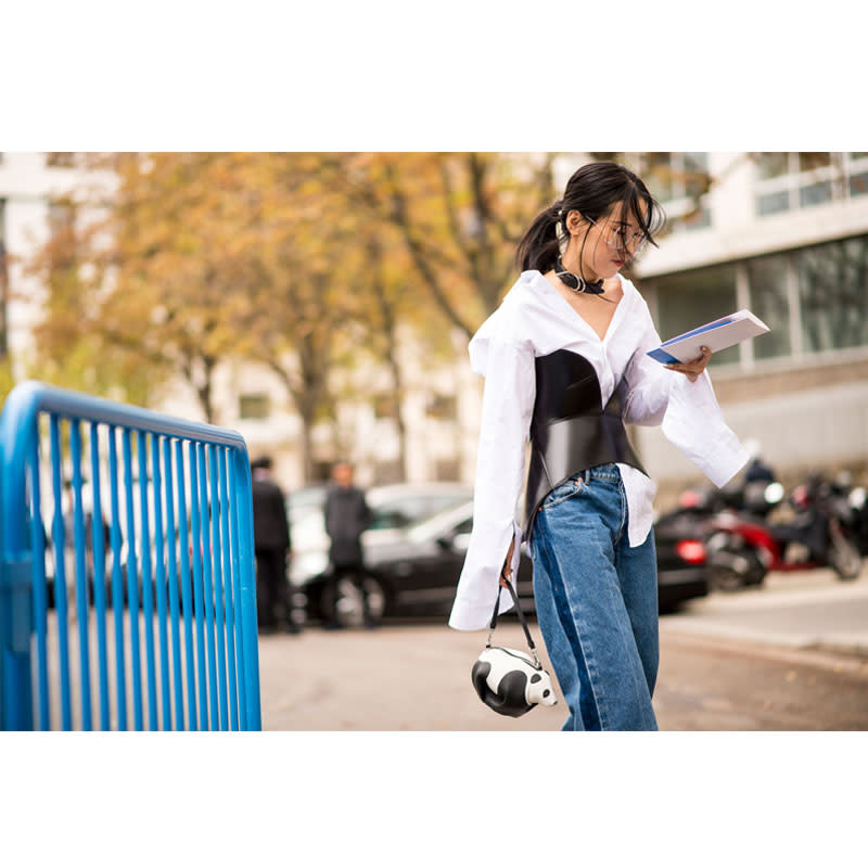 <p>Make like a fashion editor and pair your true blues with a <a rel="nofollow noopener" href="http://thezoereport.com/fashion/shopping/how-to-wear-corset-bustier-bralette-trend/" target="_blank" data-ylk="slk:bustier layered over a button-up;elm:context_link;itc:0;sec:content-canvas" class="link ">bustier layered over a button-up</a> shirt.</p> <h4>Imaxtree</h4>