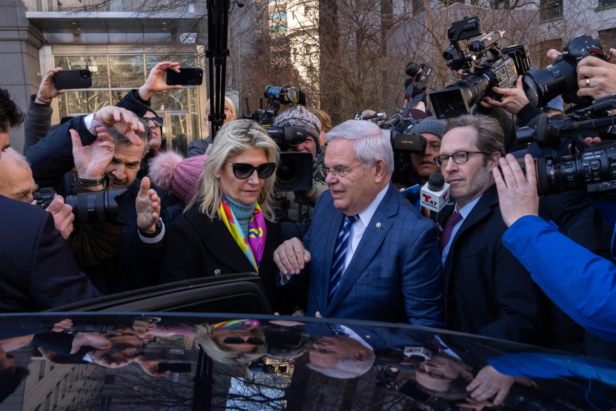 US Senator Bob Menendez leaves with his wife Nadine Menendez the Manhattan Federal Court, in New York City following his arraignment on 11 March 2024 (AFP via Getty Images)