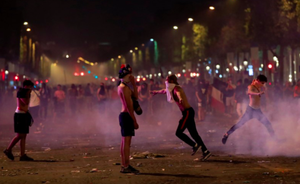 <em>Thugs threw stones and other projectiles at officers (Reuters)</em>