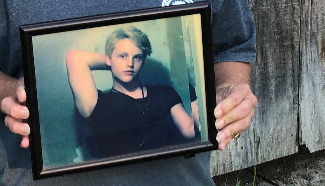 Sandy Smith holds a photo of her late son, 19-year-old Stephen Smith, on June 24, 2021. “There will never be another one like him,” she said.  