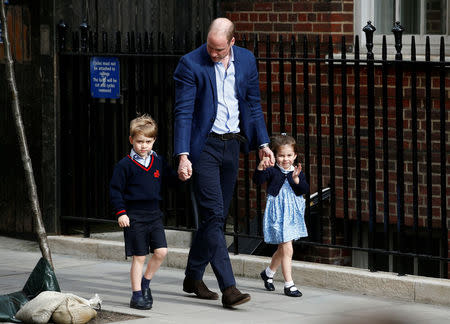 Britain's Prince William arrives at the Lindo Wing of St Mary's Hospital with his children Prince George and Princess Charlotte after his wife Catherine, the Duchess of Cambridge, gave birth to a son, in London, April 23, 2018. REUTERS/Henry Nicholls