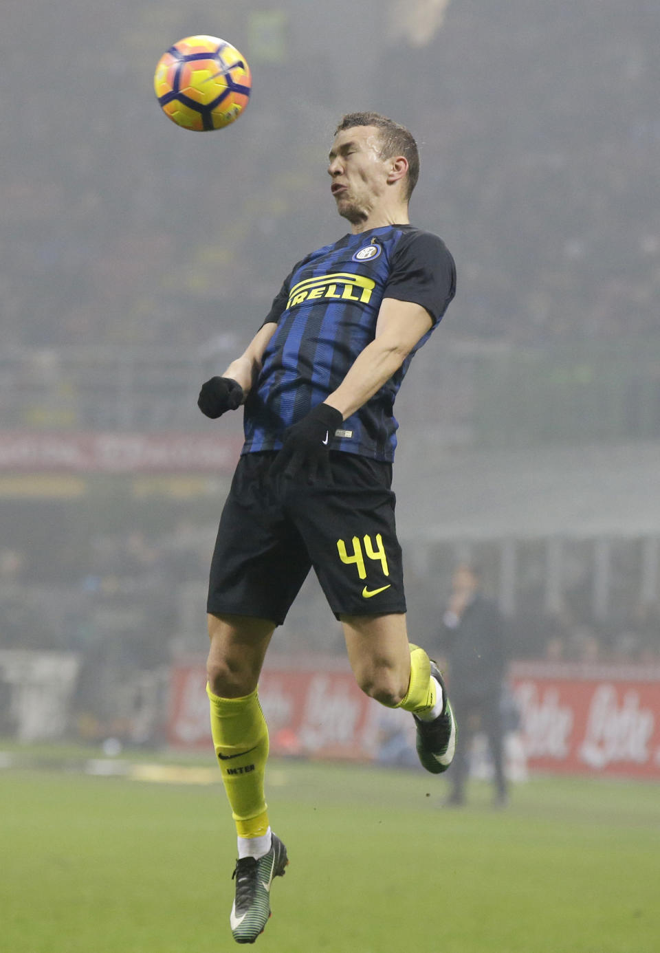 Inter Milan's Ivan Perisic jumps for the ball during an Italian Cup quarterfinal soccer match between Inter Milan and Lazio, at the San Siro stadium in Milan, Italy, Tuesday, Jan. 31, 2017. (AP Photo/Luca Bruno)